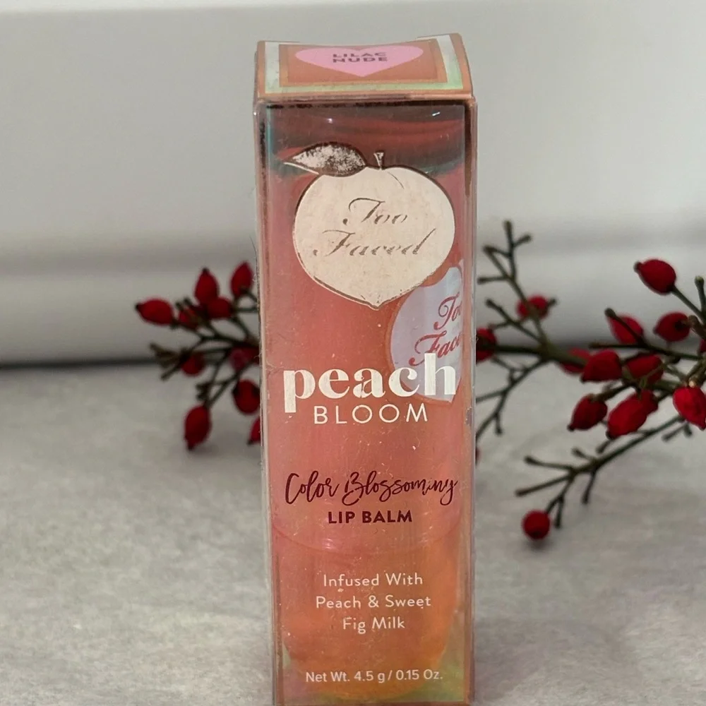 Too Faced Peach Bloom Color Blossomny Lip Balm - color is Lilac Bloom